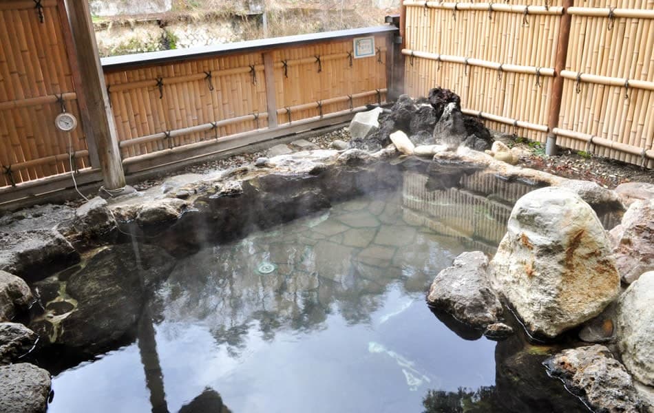 Rock Open-Air Baths Facing the River