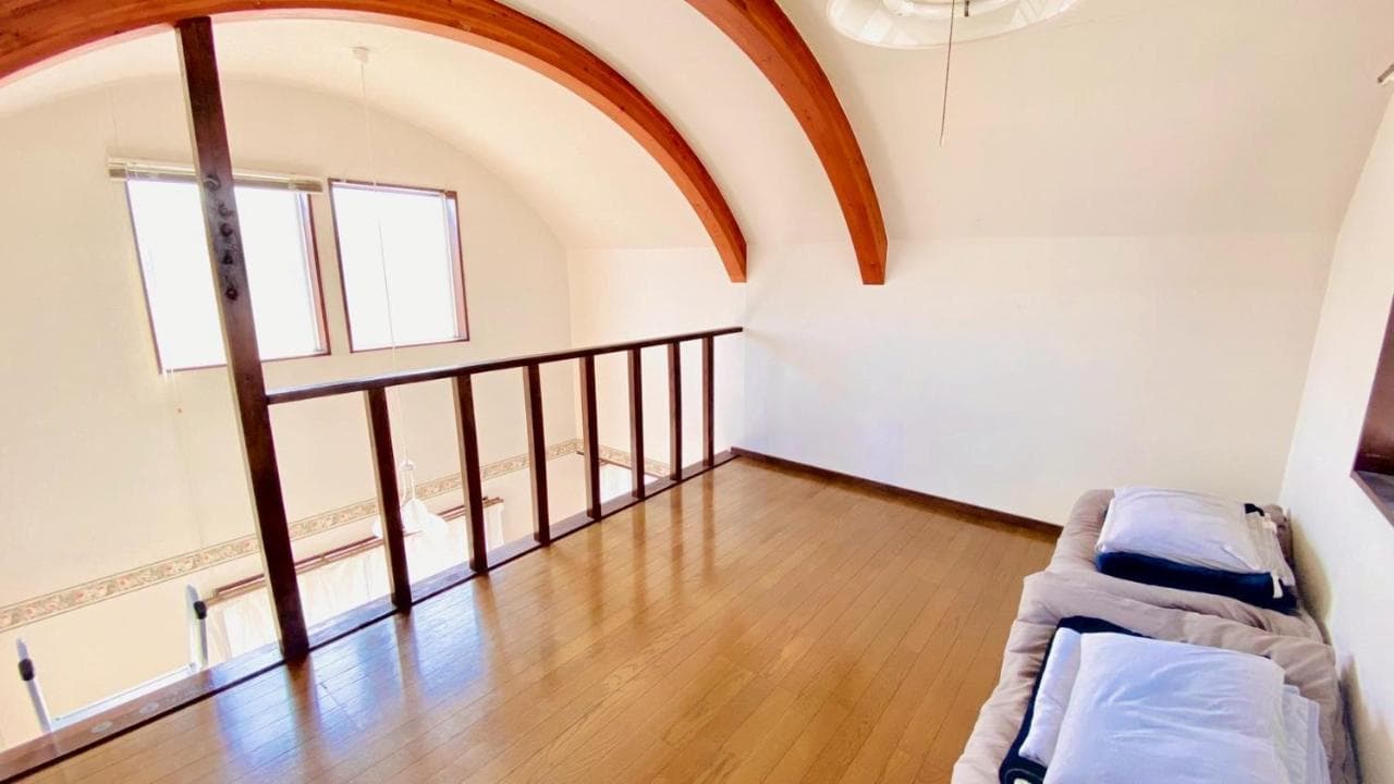 An Attic Room with an Arched Ceiling