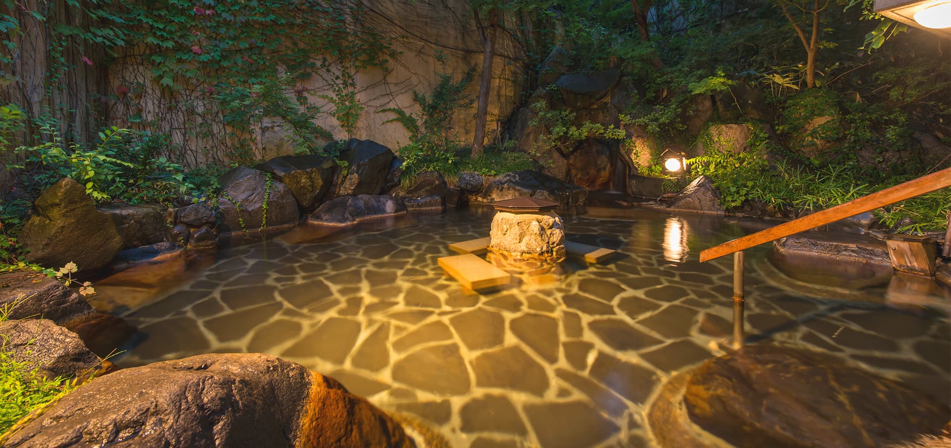 Rock or hinoki — two moods of bathing
