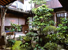 A Still Courtyard and Painted Screens