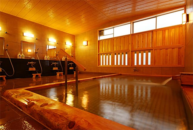 A Large Communal Bath, Fragrant with Wood