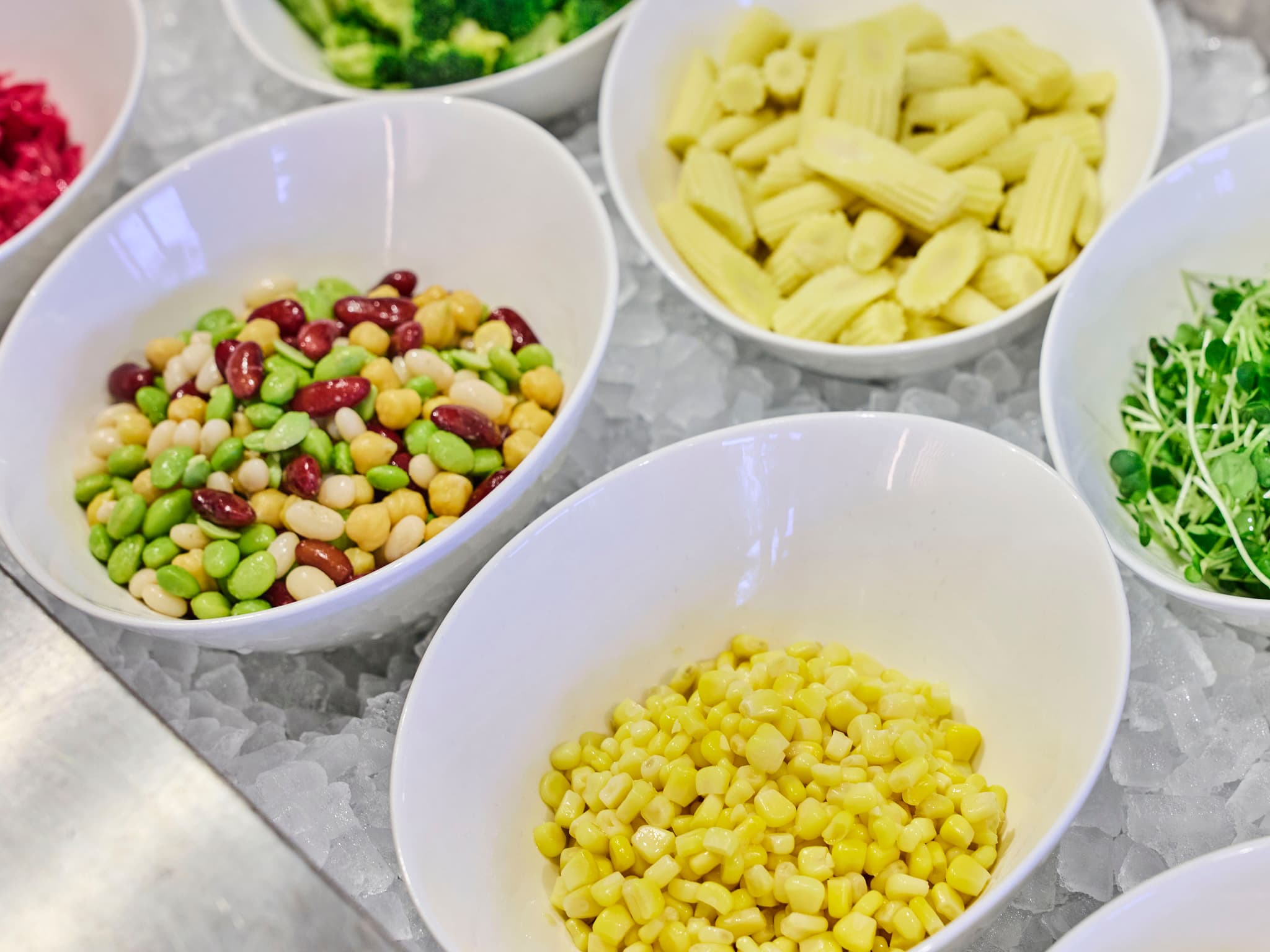 Breakfast buffet | A salad corner featuring crisp, colorful, and fresh vegetables.