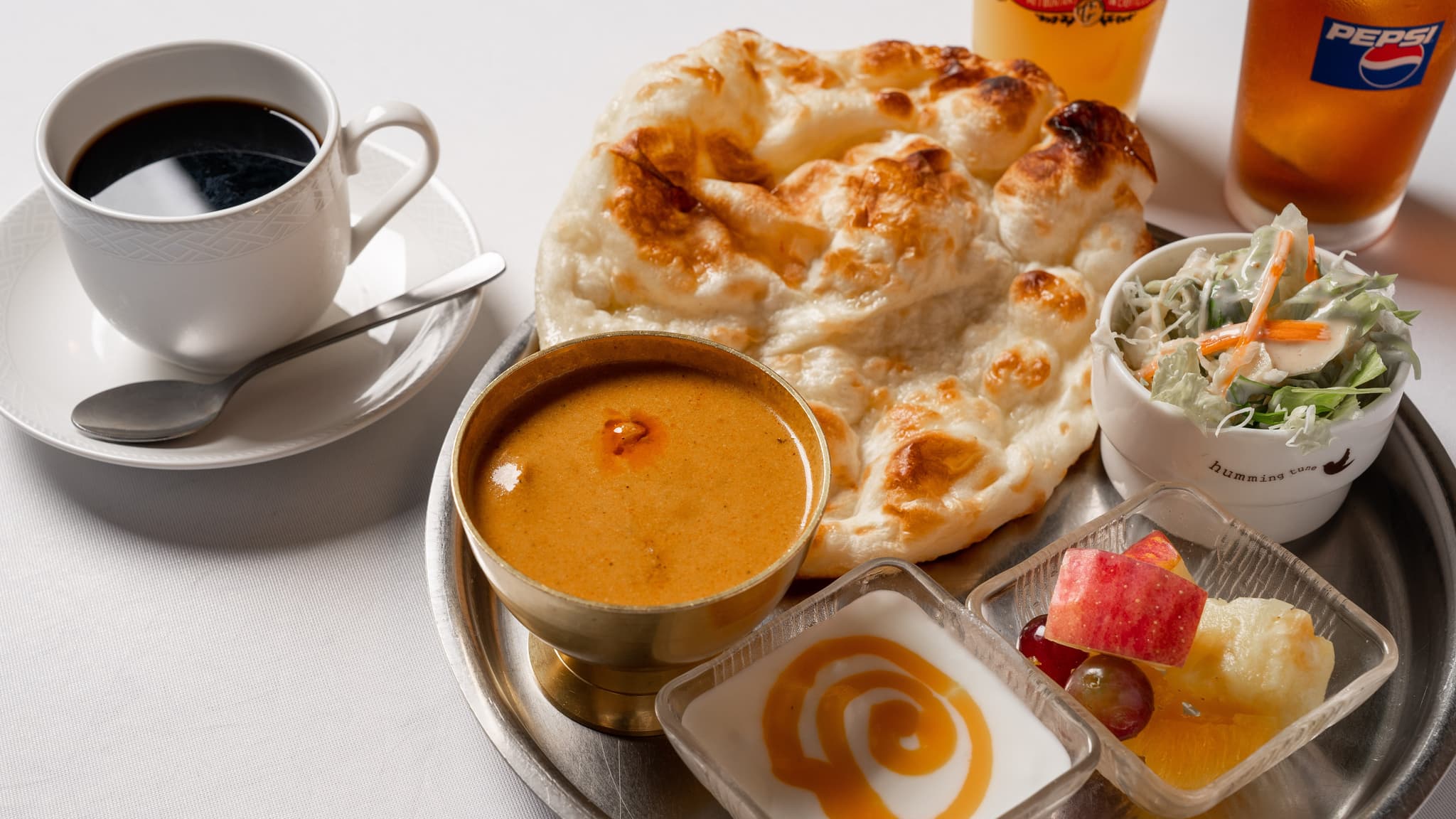 Our curry is made by our staff in Nepal.