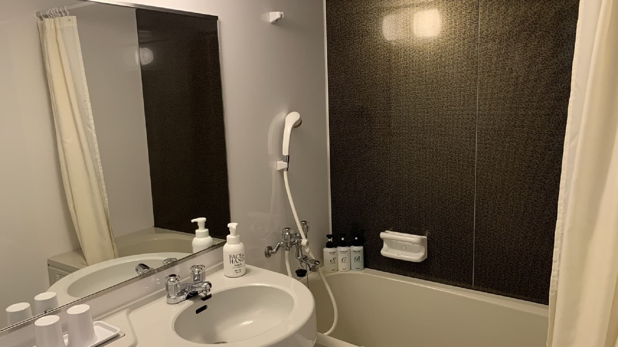 Bathroom (bath towels are on the upper gold shelf)