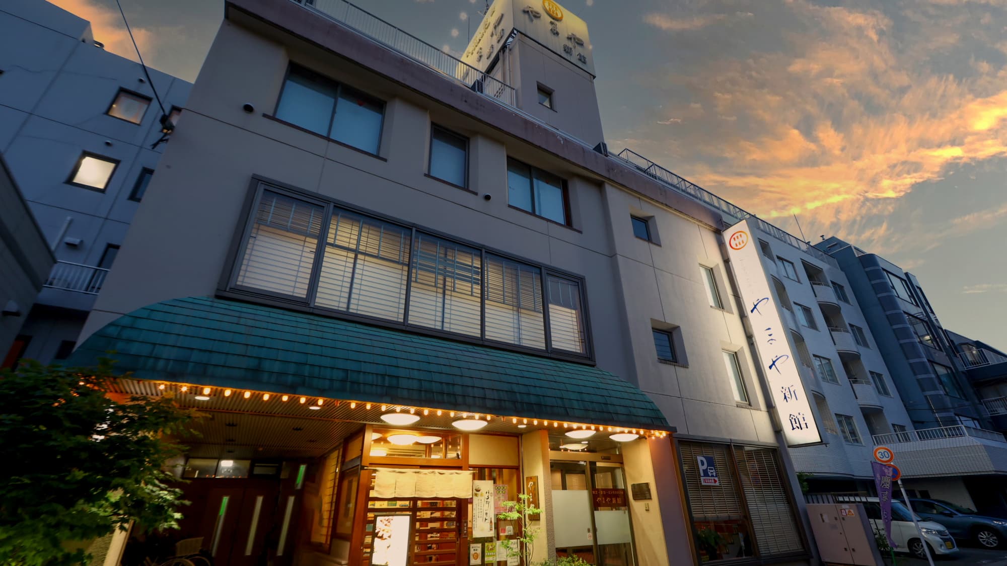 Image of the Consulate (dusk)