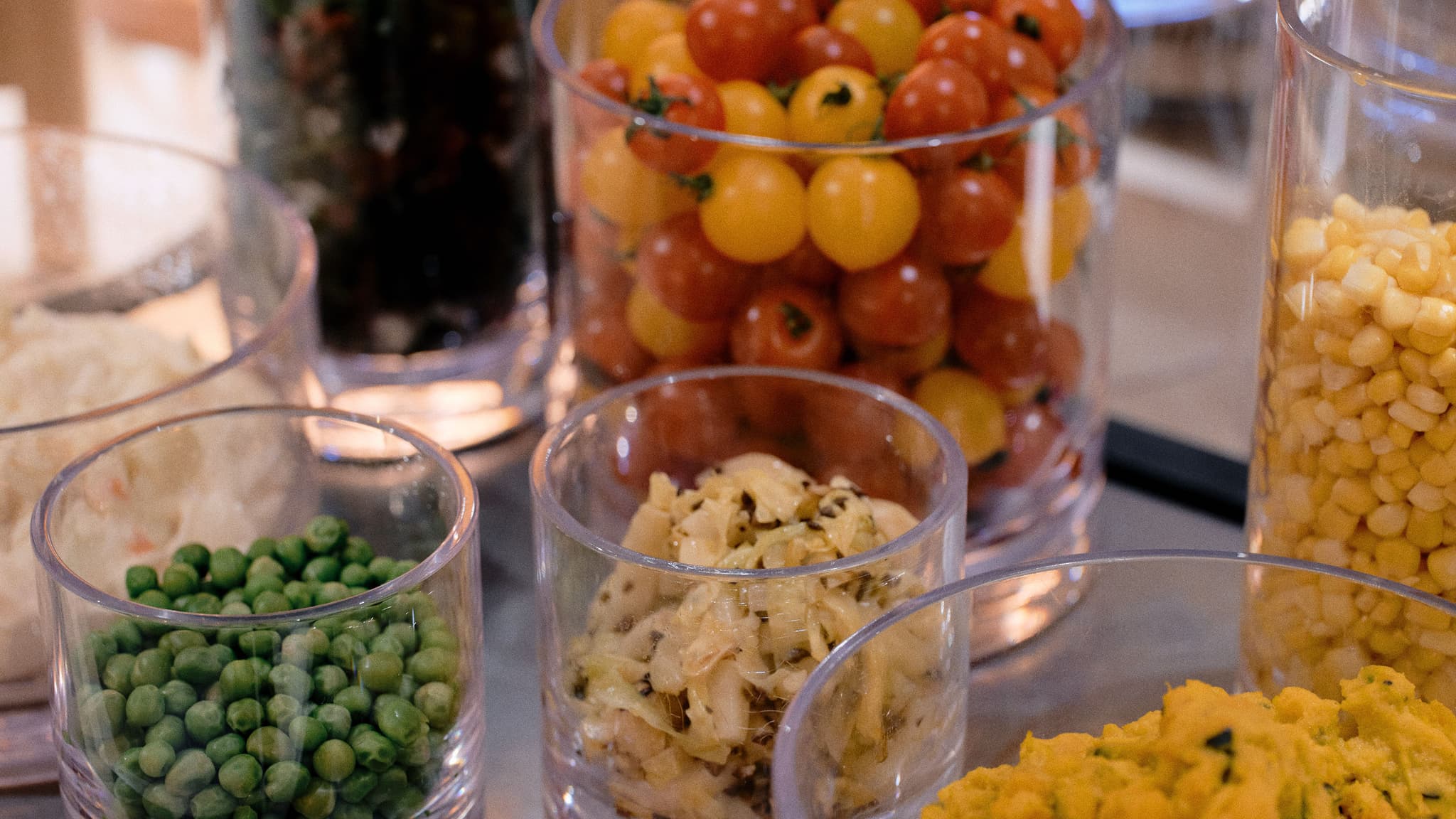 Breakfast Buffet | Enjoy our salad bar featuring a vibrant array of fresh, colorful vegetables.