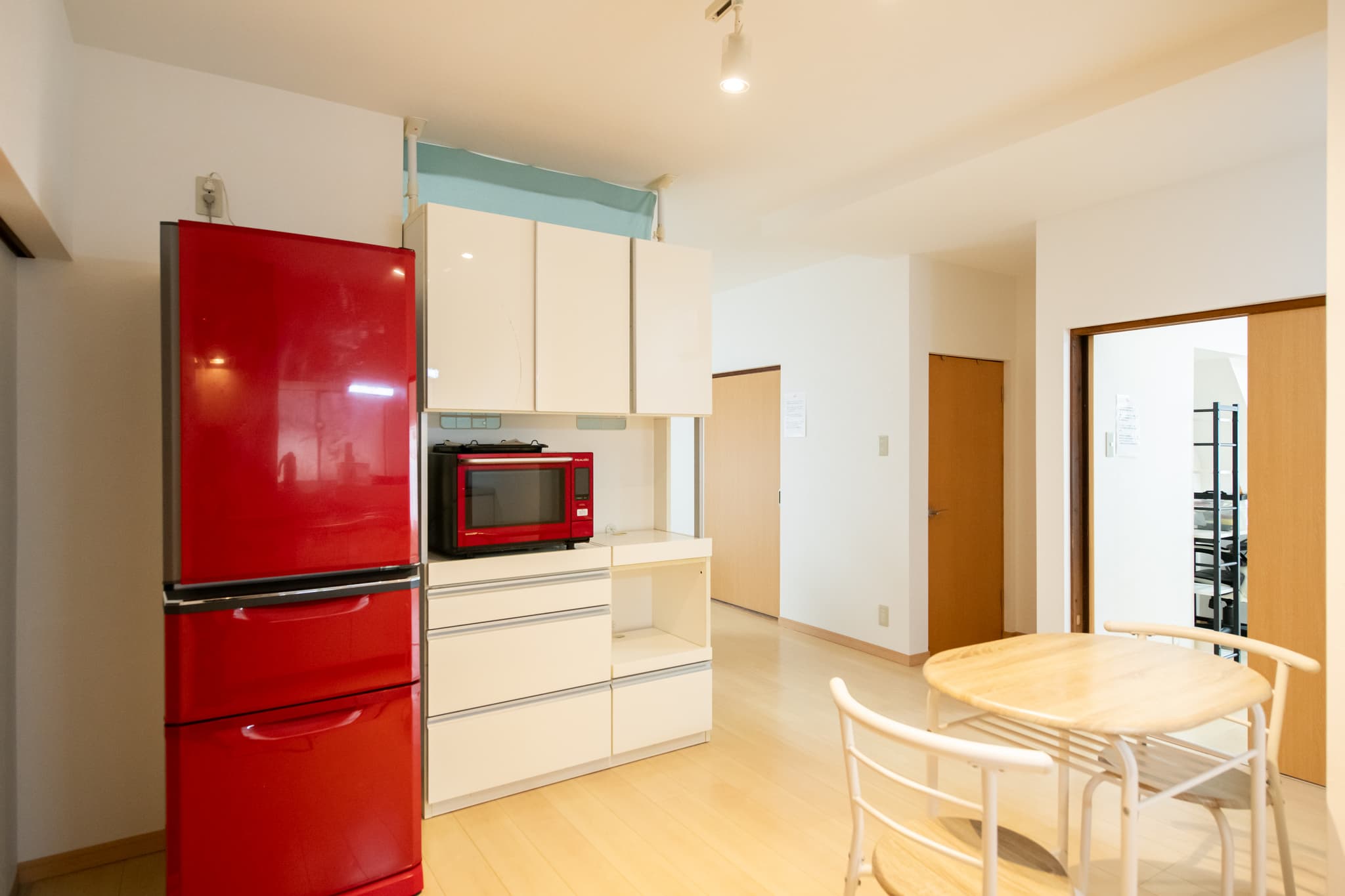 Three bedrooms and a kitchen