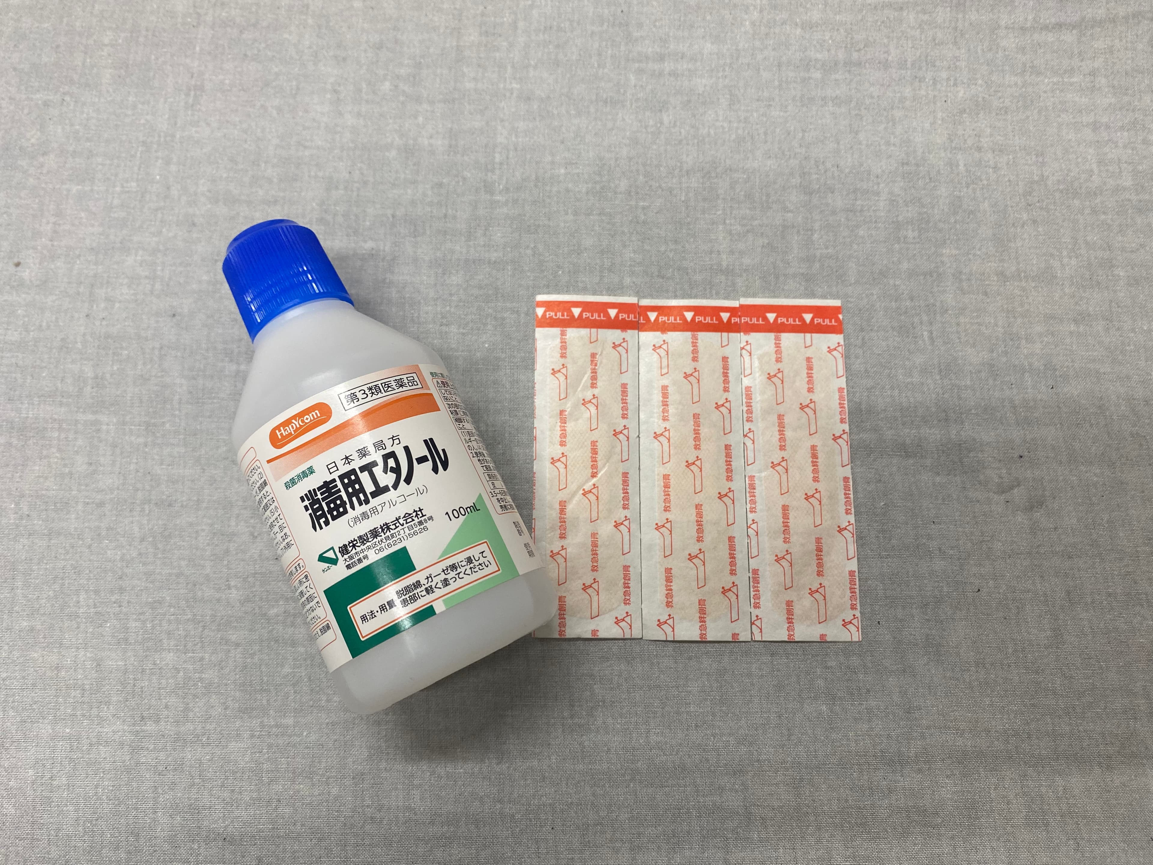Disinfectant, adhesive plaster