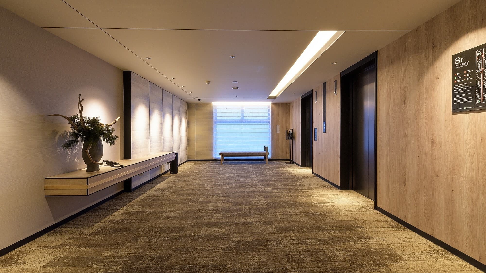 [Facilities] "Elevator Hall" The soft lighting and large, open windows make this a great space to take a breather before moving on to the next step.