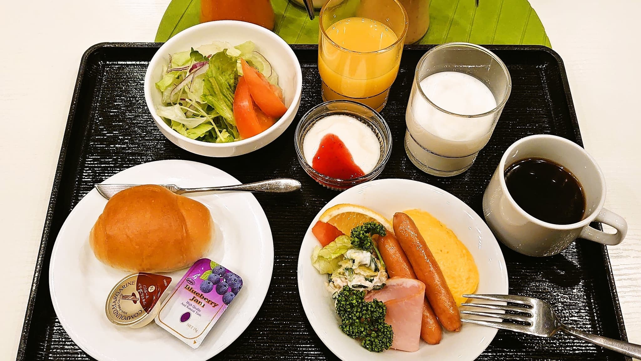Breakfast buffet with serving image