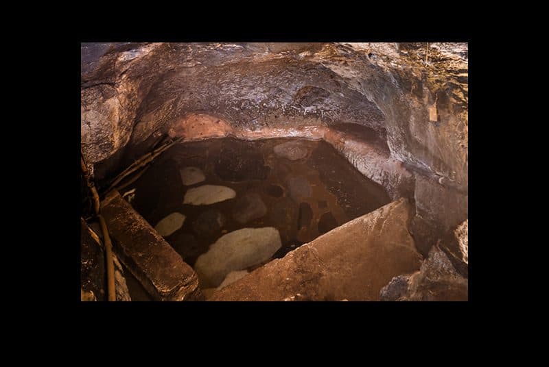 Hand-carved women's cave bath