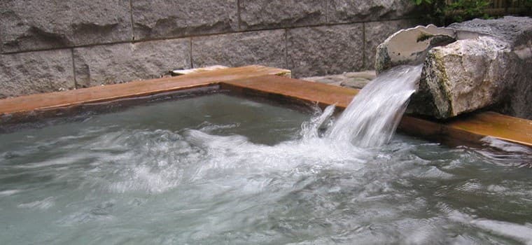 A Stone-Walled Open-Air Garden Bath