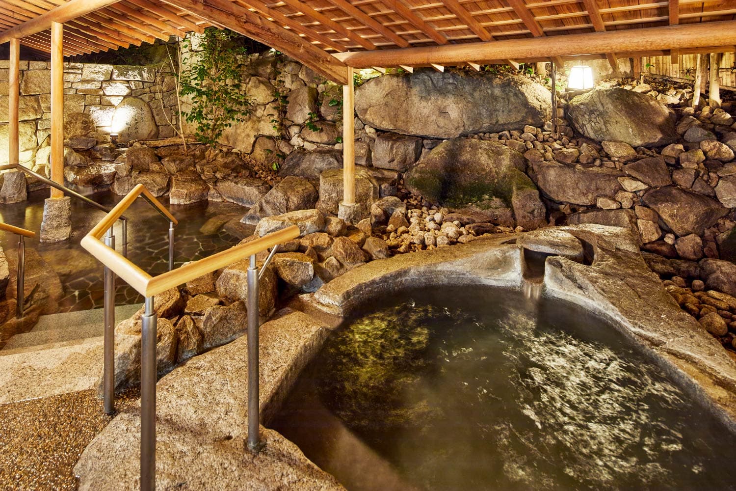 A Communal Bath of Cypress and Stone