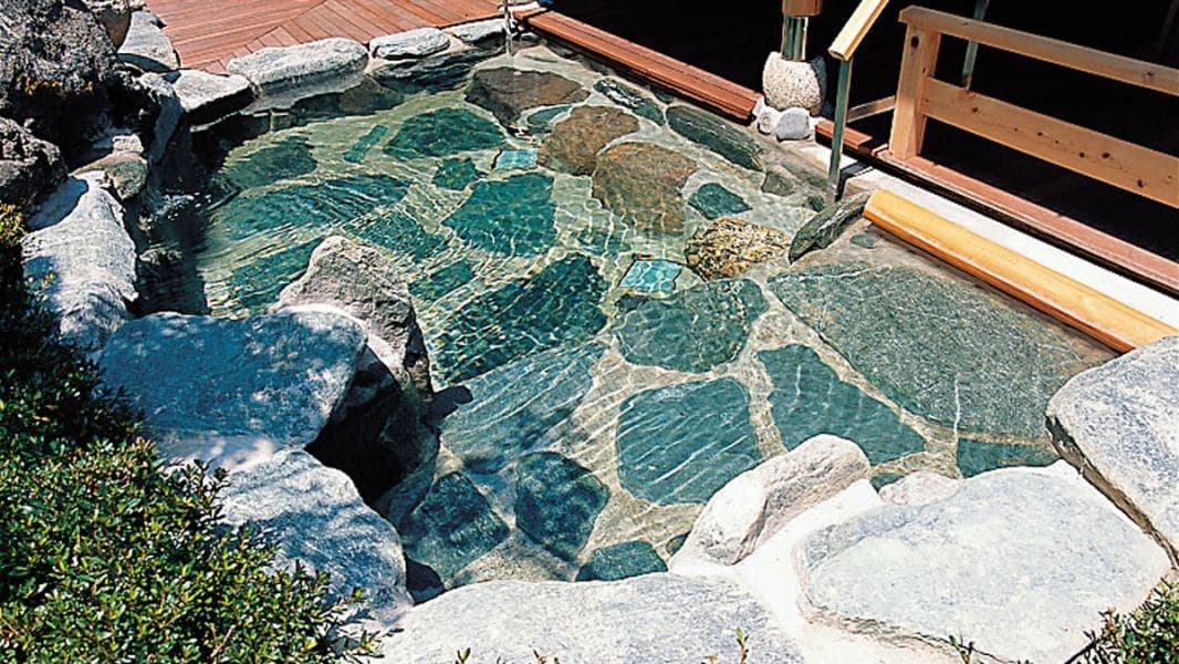 A Cave Bath and the 'Hugging Rock'