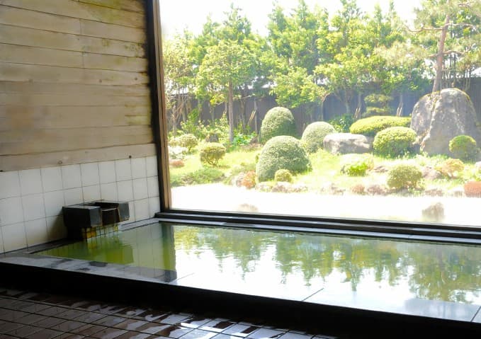 A Small Bathhouse With Sauna and Garden