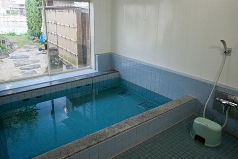 Relaxing in the Shared Grand Bath