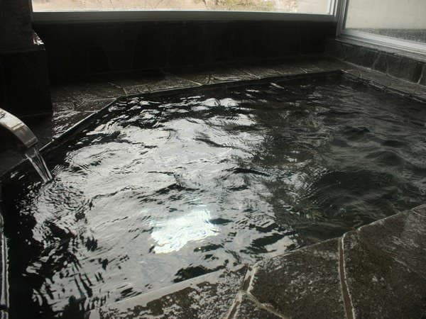 Bathing Amid Natural Stone