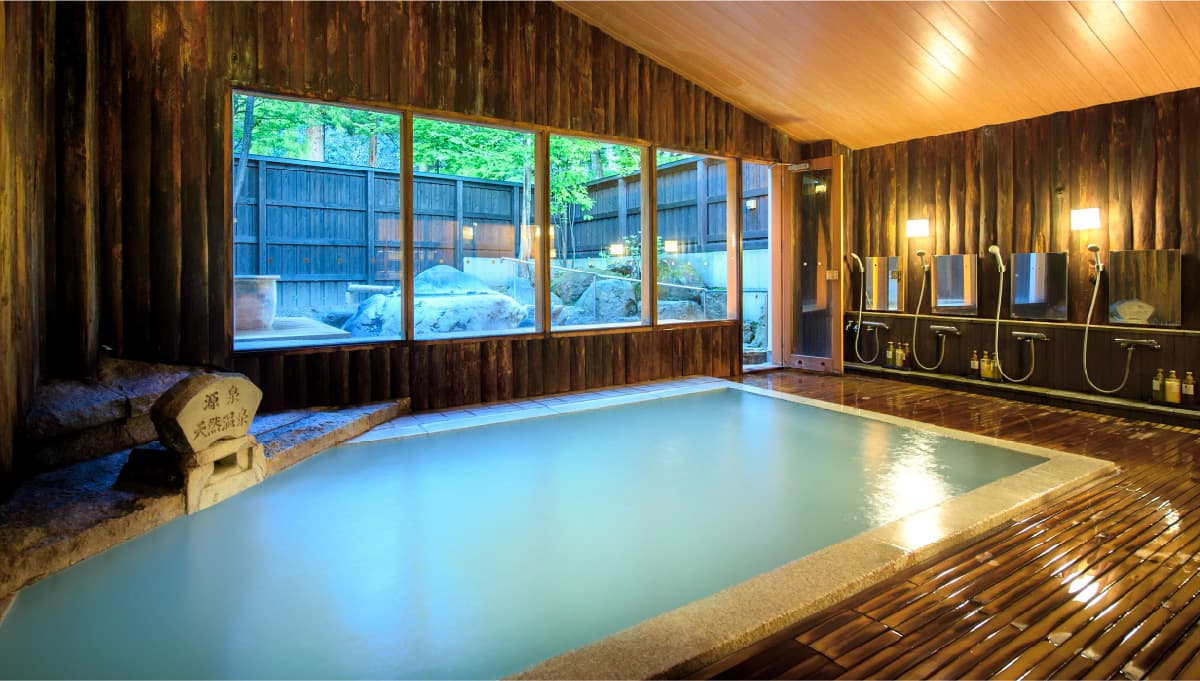 Wood-Scented Communal and Private Baths