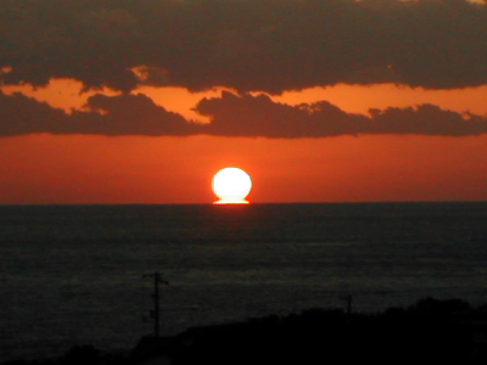 Sunset Sinking into the Horizon