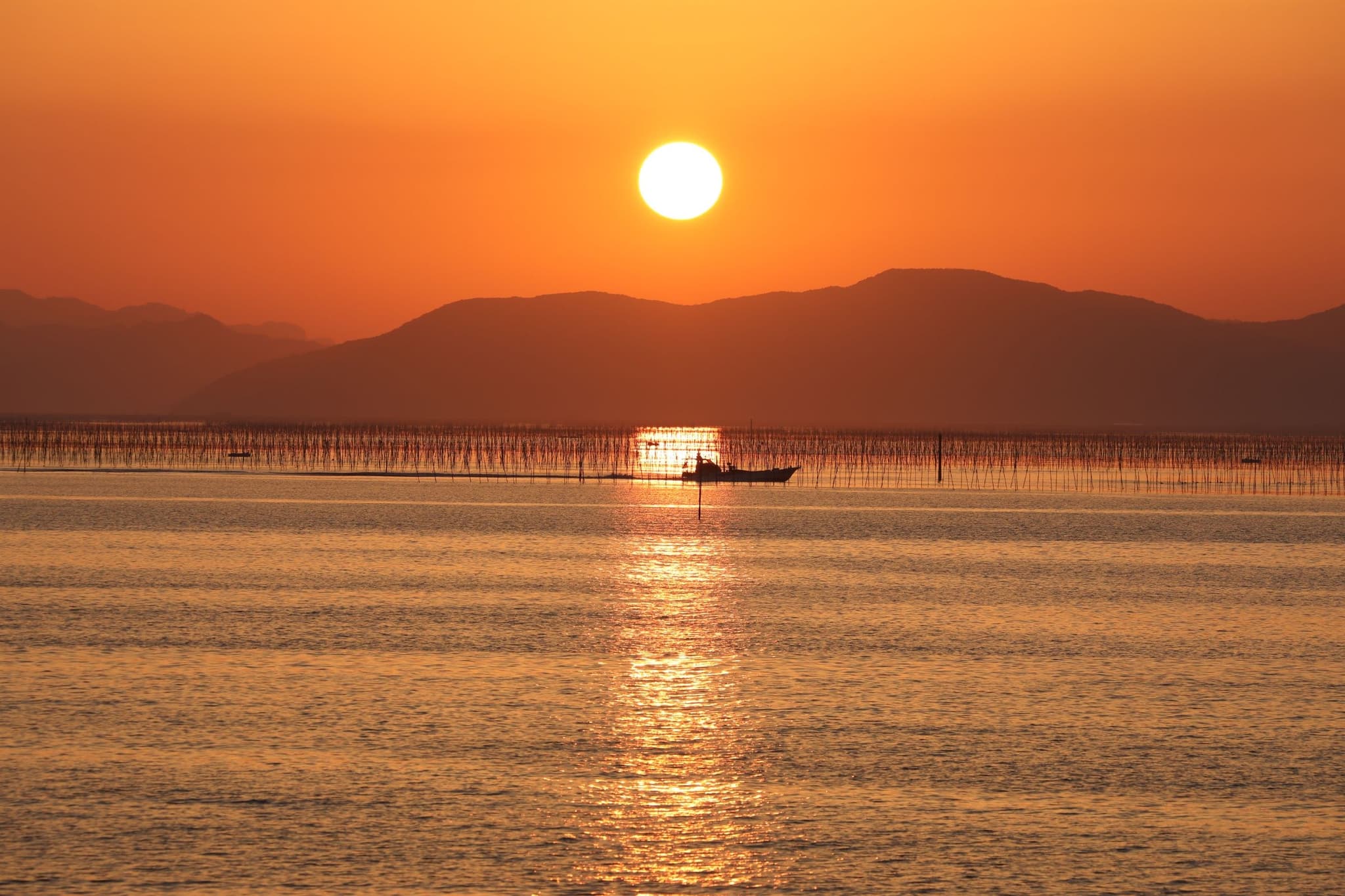 Sunset over the Ariake Sea and the Scenery of a Water Town