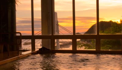 Watching the Sunset over the Sea from the Bath