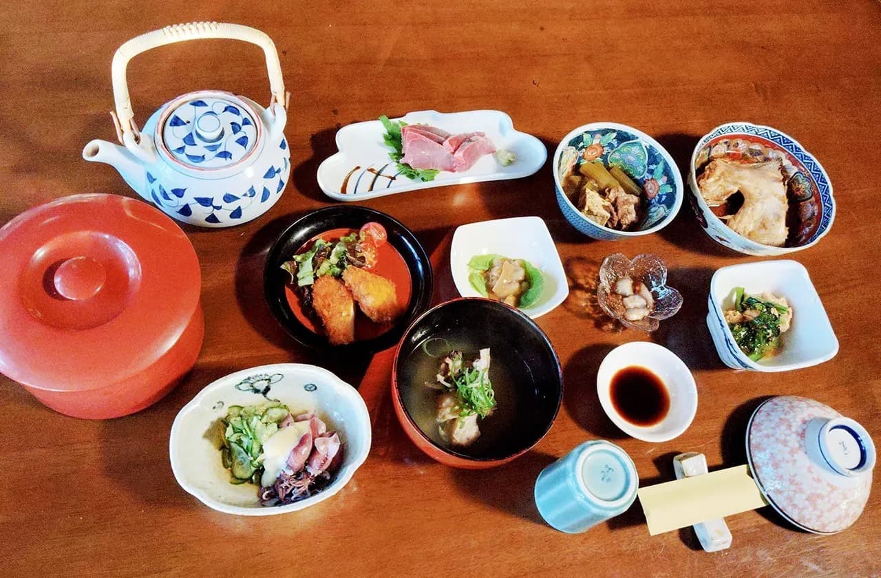 A Dinner Table Filled With Toyama's Sea