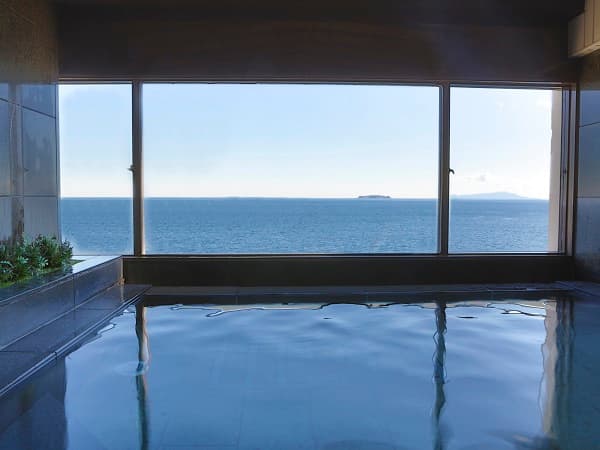 Hot spring bath above the sea