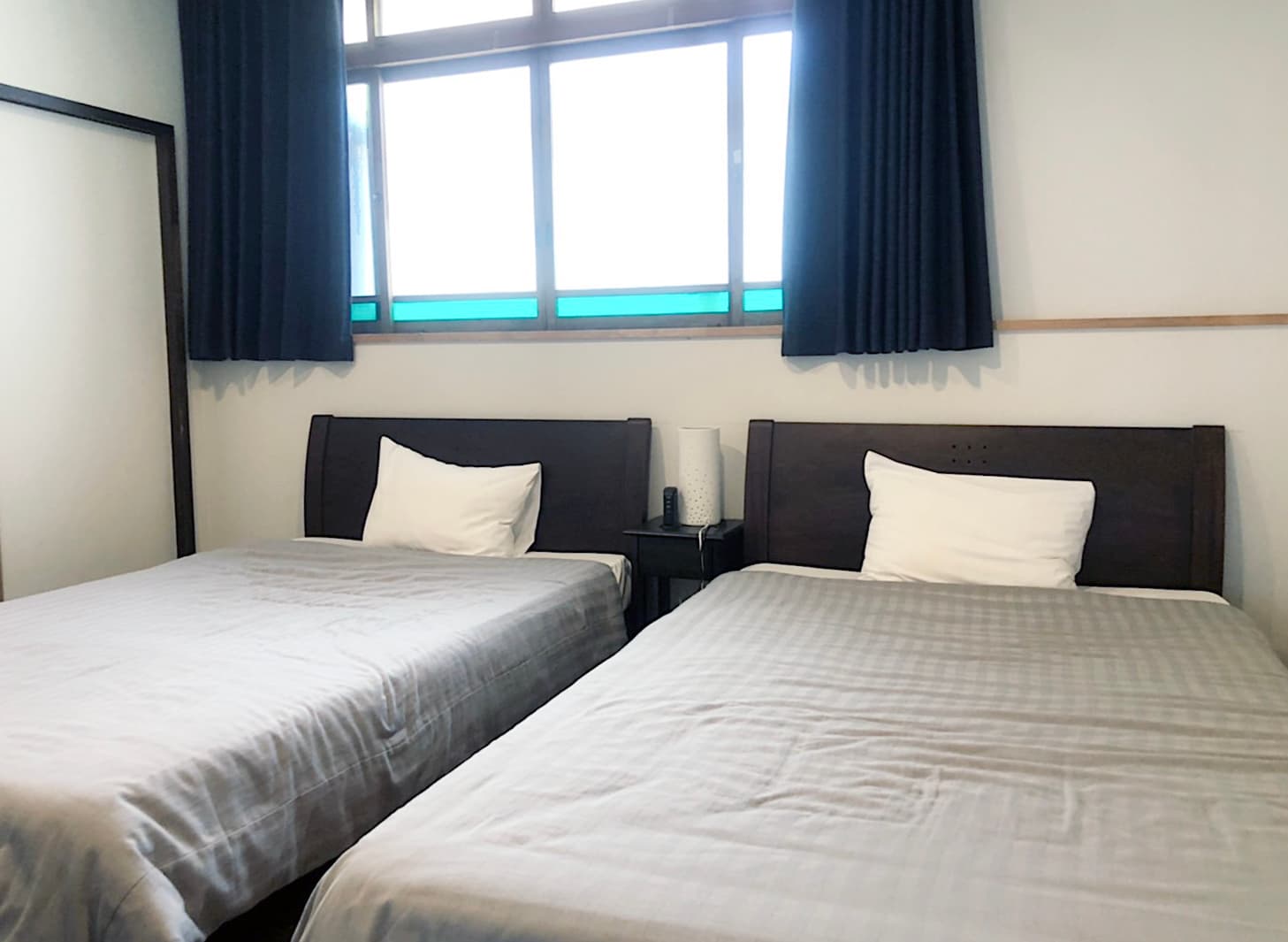 Dorm beds to private-bath twins