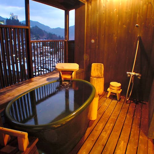 A Cypress Open-Air Bath Brushed by the River Breeze